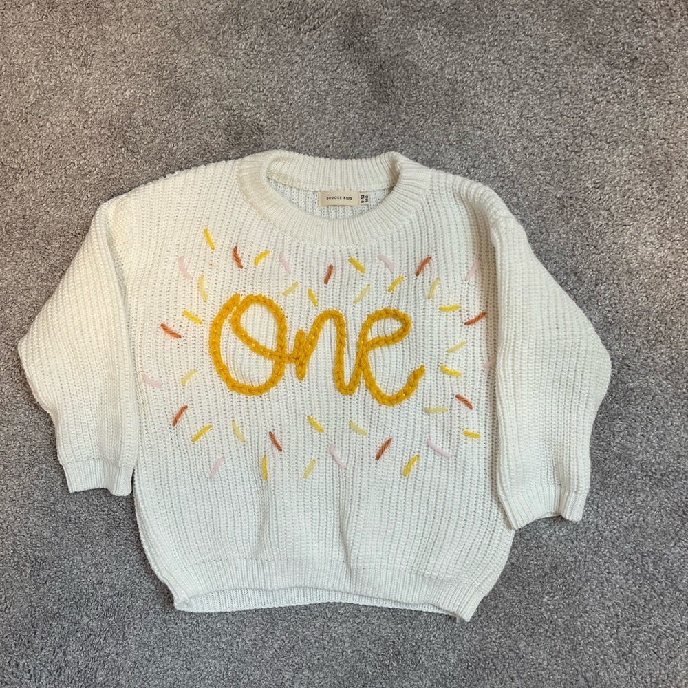 “One” boutique sweater